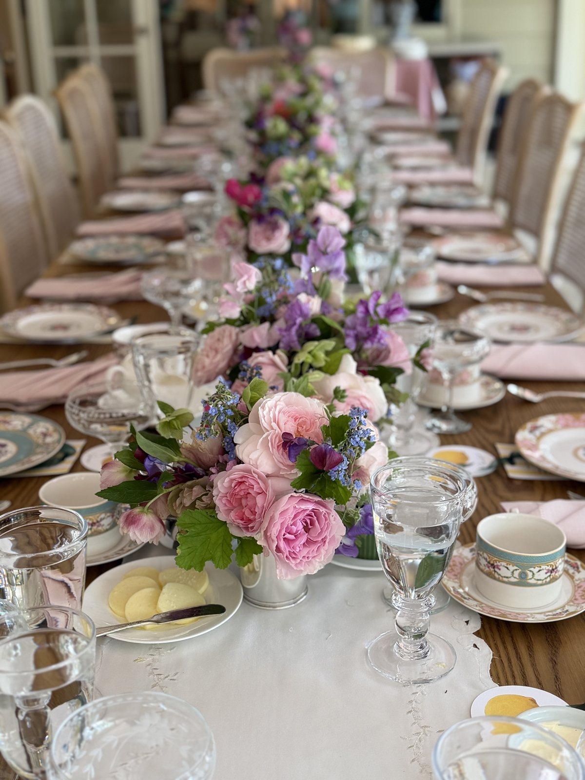 Floral runner along a set dining table