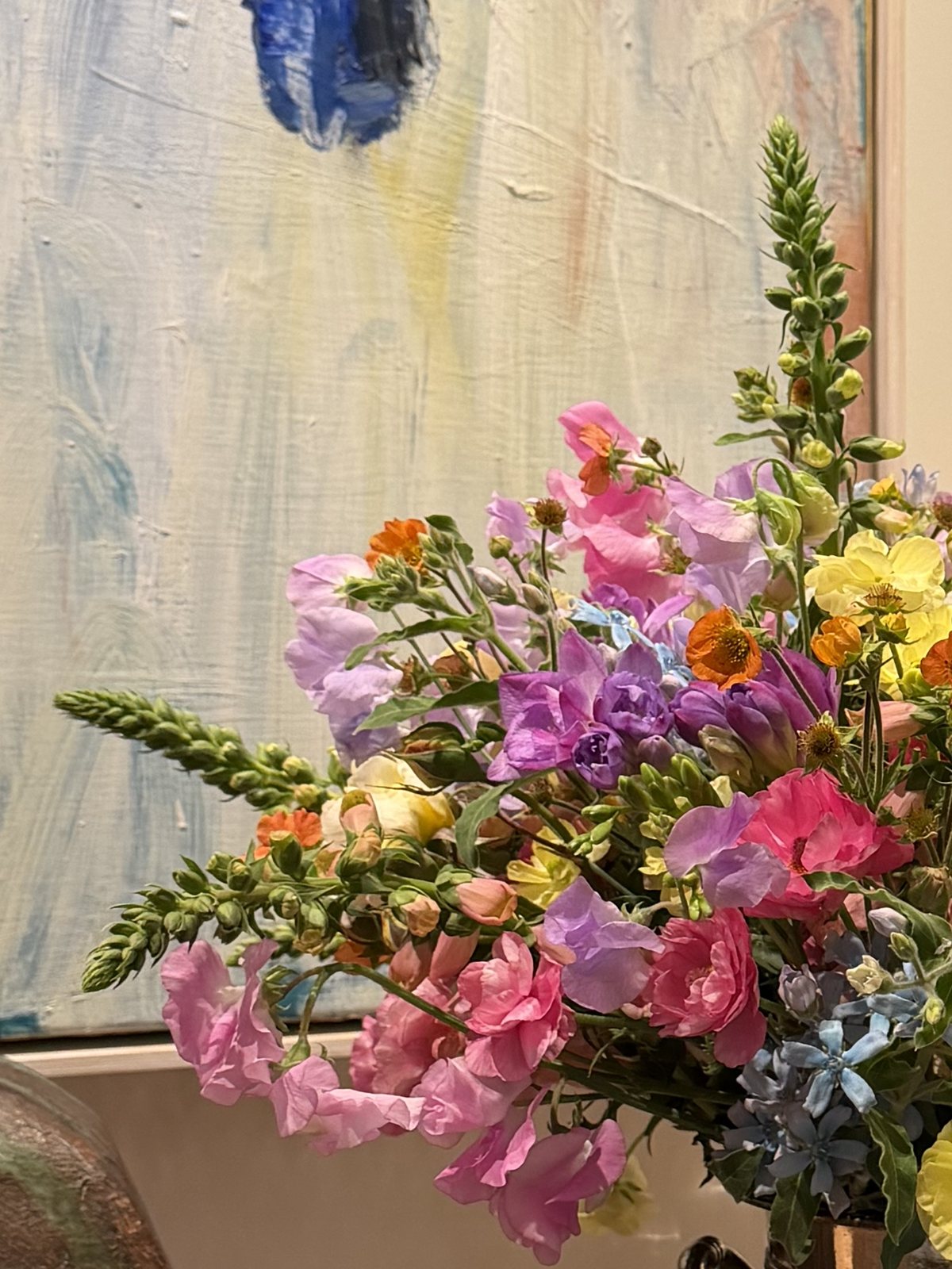 Wildflower arrangement with sweet peas and geum