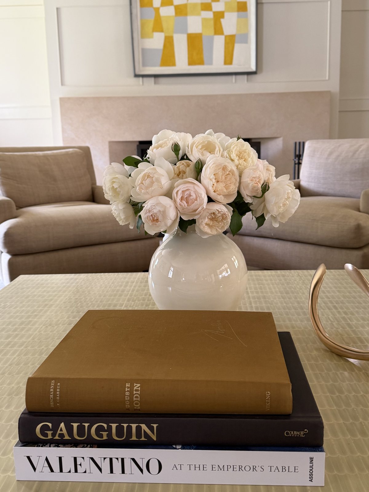 Cream garden roses in a white vase