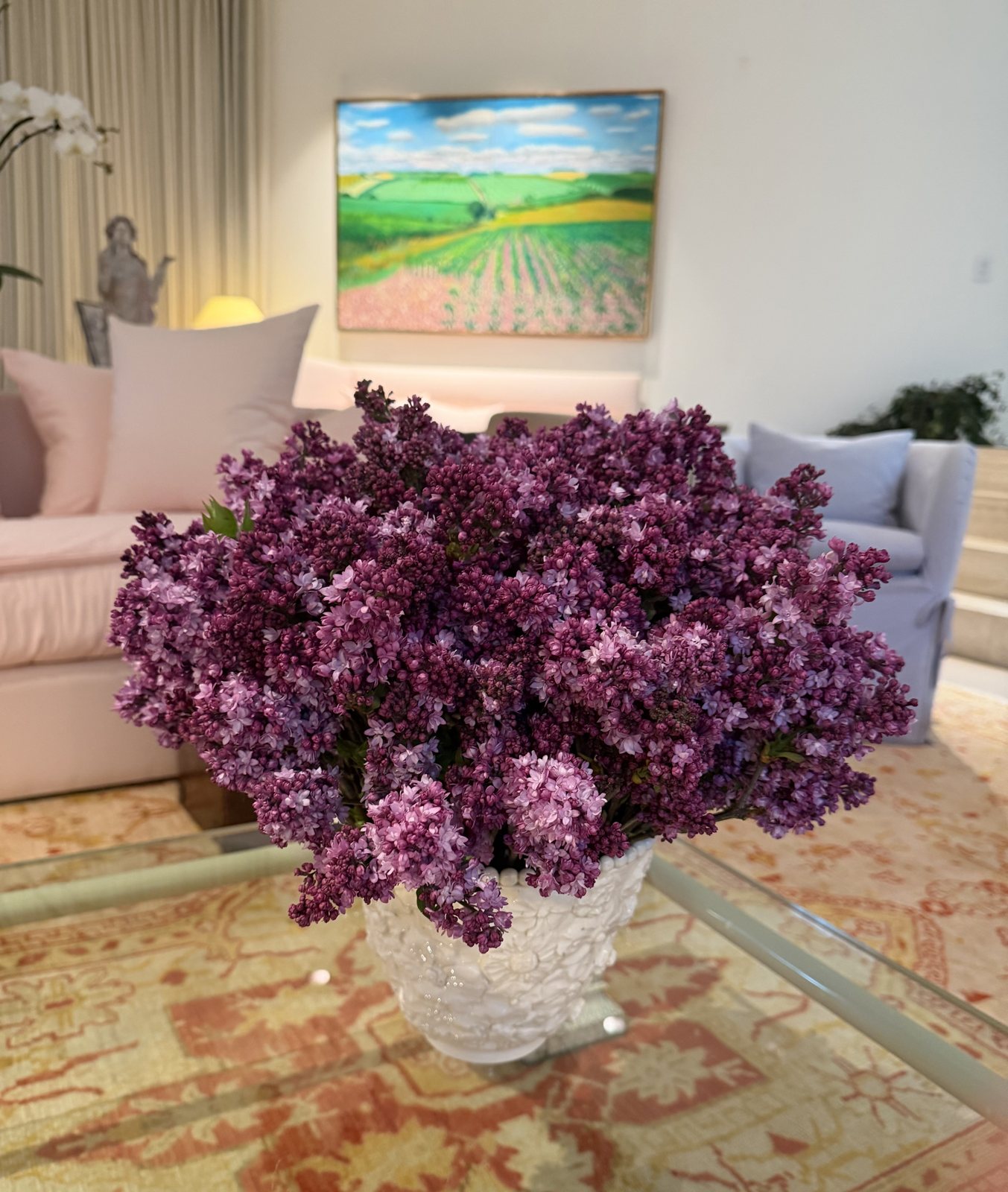 Lilacs in a white vase