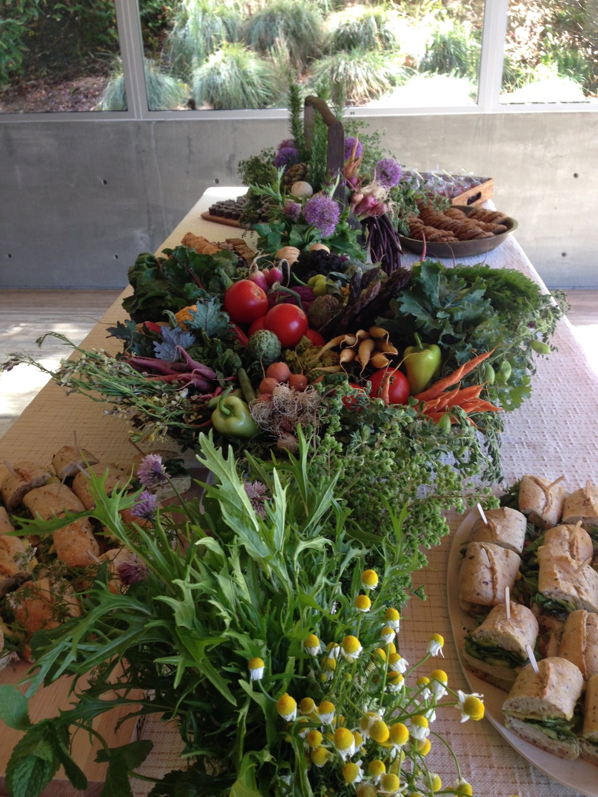 A harvest table styled for a garden gathering